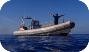 Genis manning the Boat during a dive